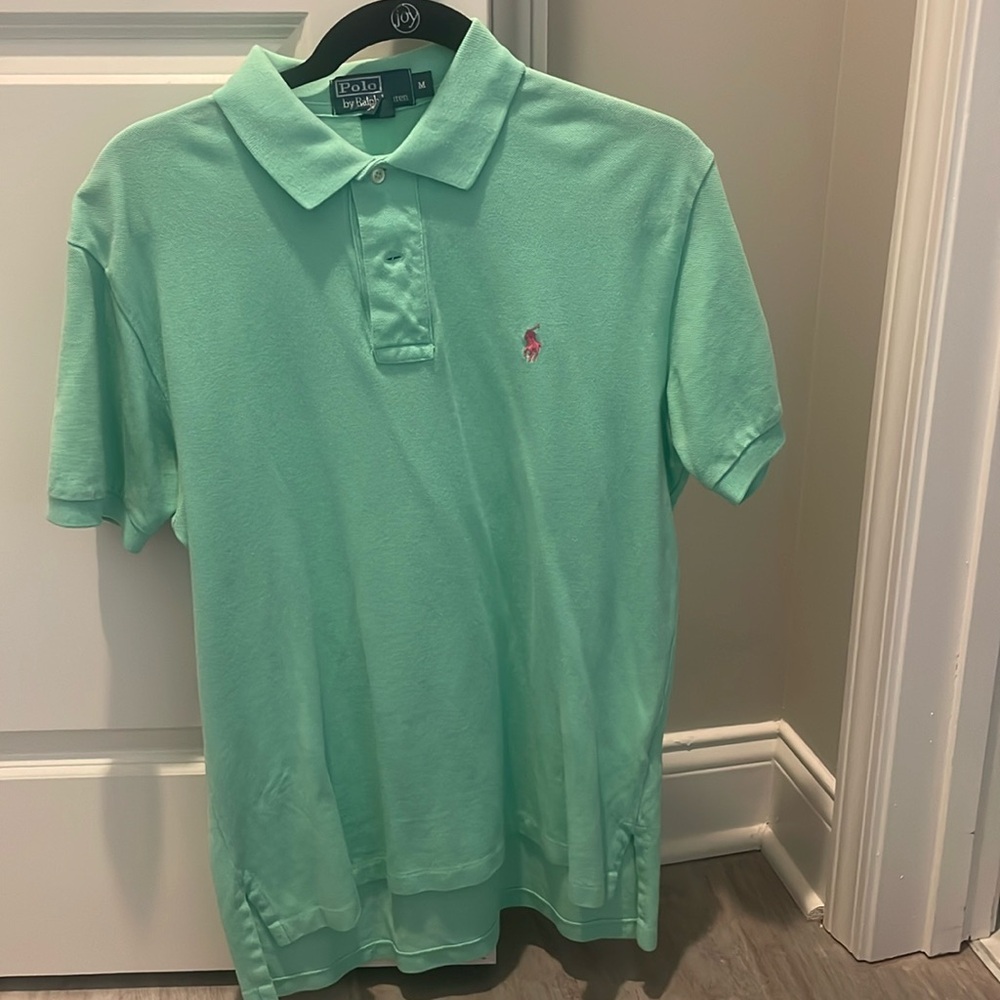 Polo Ralph Lauren polo. Color is close to teal. Logo is pink. Size M